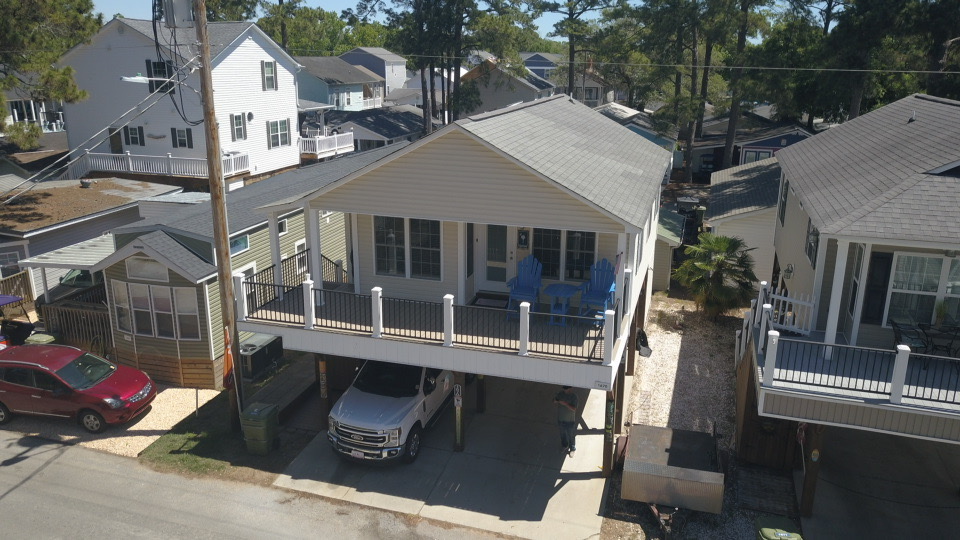 Aerial front view of 1670 OL Beach House
